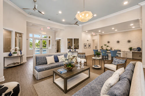 Clubhouse lounge and coffee bar at Millennium Apartments in Fort Myers, FL