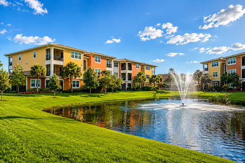 Millennium Apartments buildings overlooking the community fountain lake