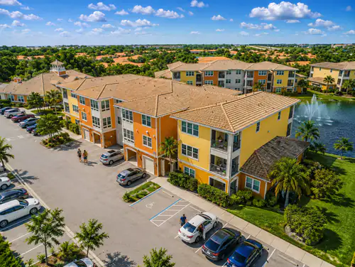 Aerial view of Millennium Apartments' buildings beside the lake